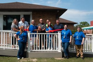 Doud house ribbon cutting