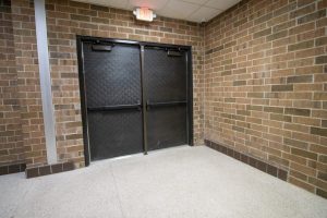 Millington Community Schools renovation, school renovation project, school security upgrades, design-build school construction, educational facility renovation, secure school vestibule, high school building addition, after-hours school safety, K-12 construction, Millington Michigan school upgrade.