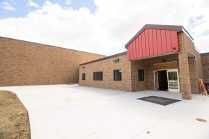 Millington Community Schools renovation, school renovation project, school security upgrades, design-build school construction, educational facility renovation, secure school vestibule, high school building addition, after-hours school safety, K-12 construction, Millington Michigan school upgrade.